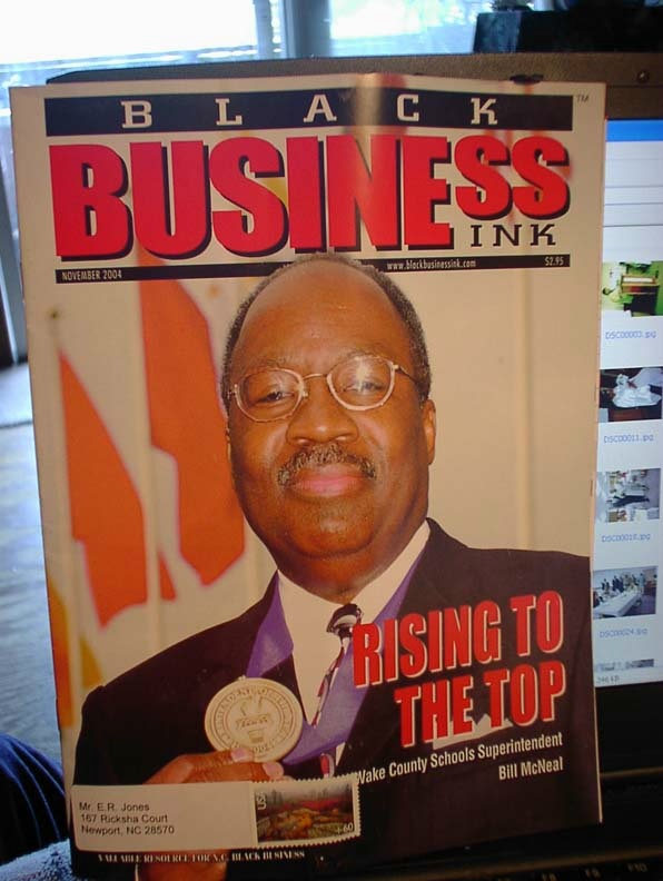 PHOTO COPIED FROM THE BLACK BUSINESS INC.
NOVEMBER 'O4 COVER ISSUE.